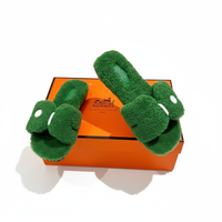 Sandali Oran in pelle shearling Hermès - Verde