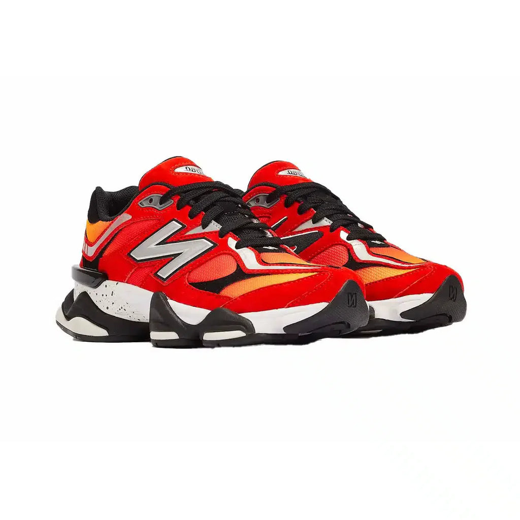 New Balance 9060 sneakers da uomo in rosso, giallo e nero – design futuristico